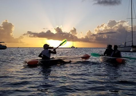 Kayaks at sunset on west coast of Barbados